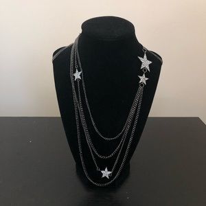 Long dark silver necklace with rhinestone stars